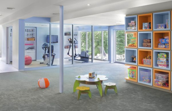 Dedicated home gym allows you to watch over the kids in the playroom