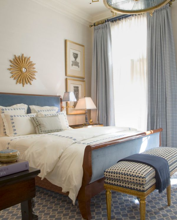 Ebonized empire-style sleigh bed blends in with the color scheme of the room