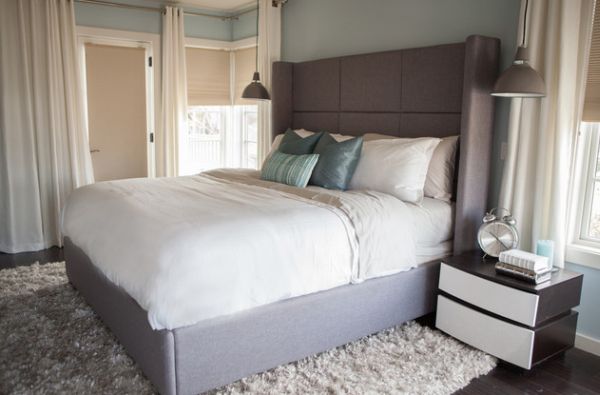 Exaggerated headboard paints a warm and cozy picture!