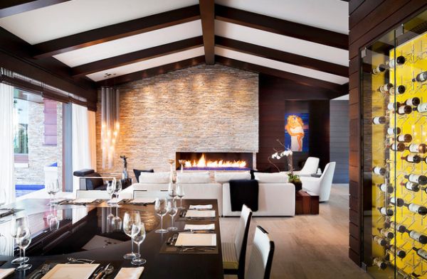 Extravagant modern dining room with lavish seating space and a fireplace