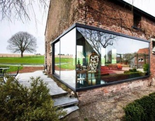 Rustic Farmhouse in Belgium Gets A Glassy Contemporary Makeover