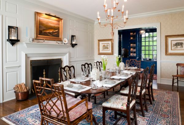 Farmhouse style dining room with traditional fireplace