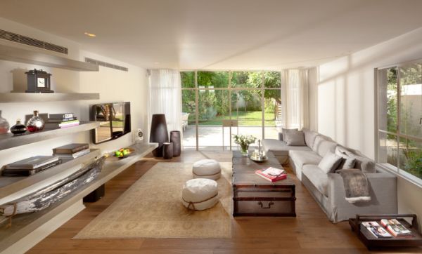 Floating shelves add an airy appeal to the living room