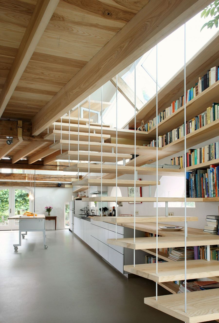 Floating wooden staircase in the dutch house