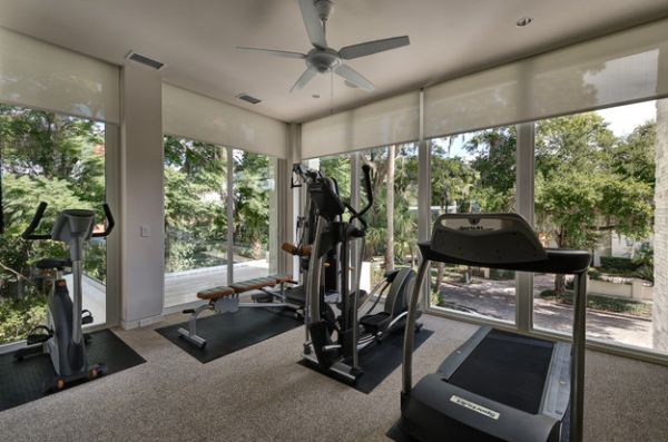 Glass walls create a light, breezy atmosphere inside the home gym