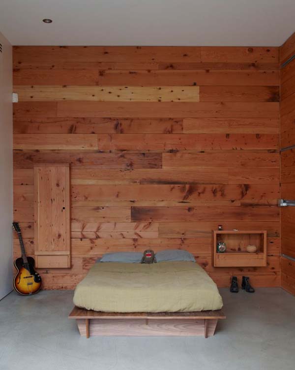 Industrial-styled bachelor home bedroom in Brooklyn