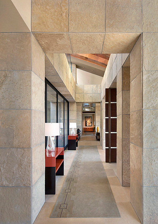 Lamps and sleek tables in a contemporary hallway