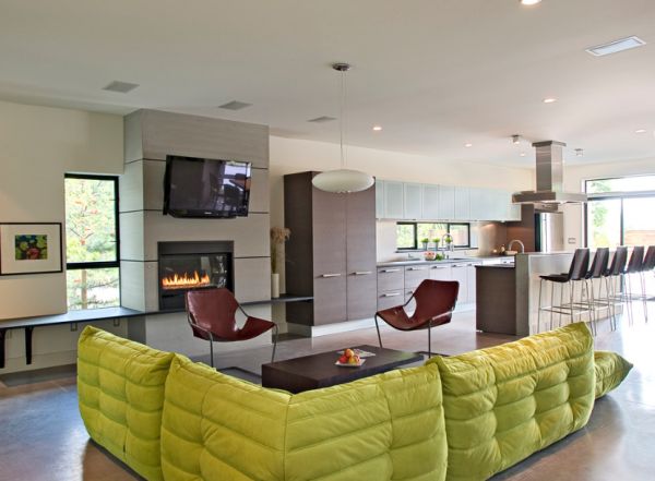Plush Togo sofa in apple green coupled with twin Paulistano chairs in brown