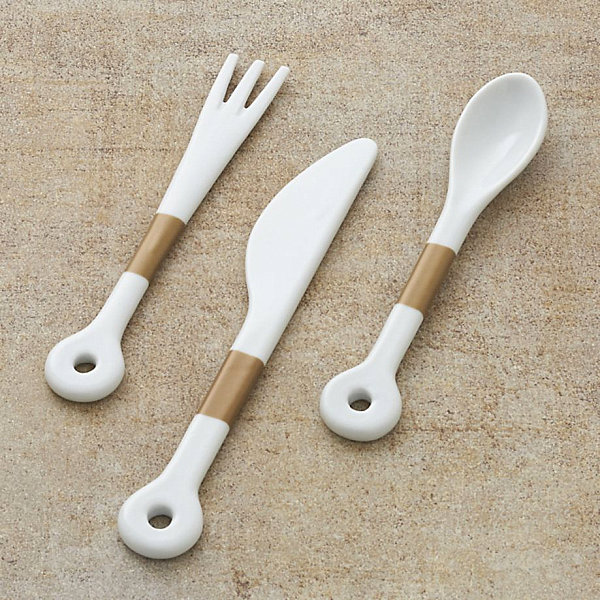 Porcelain serving utensils with gold bands