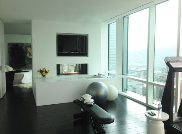 Sleek and stylish exercise room connected to the bedroom