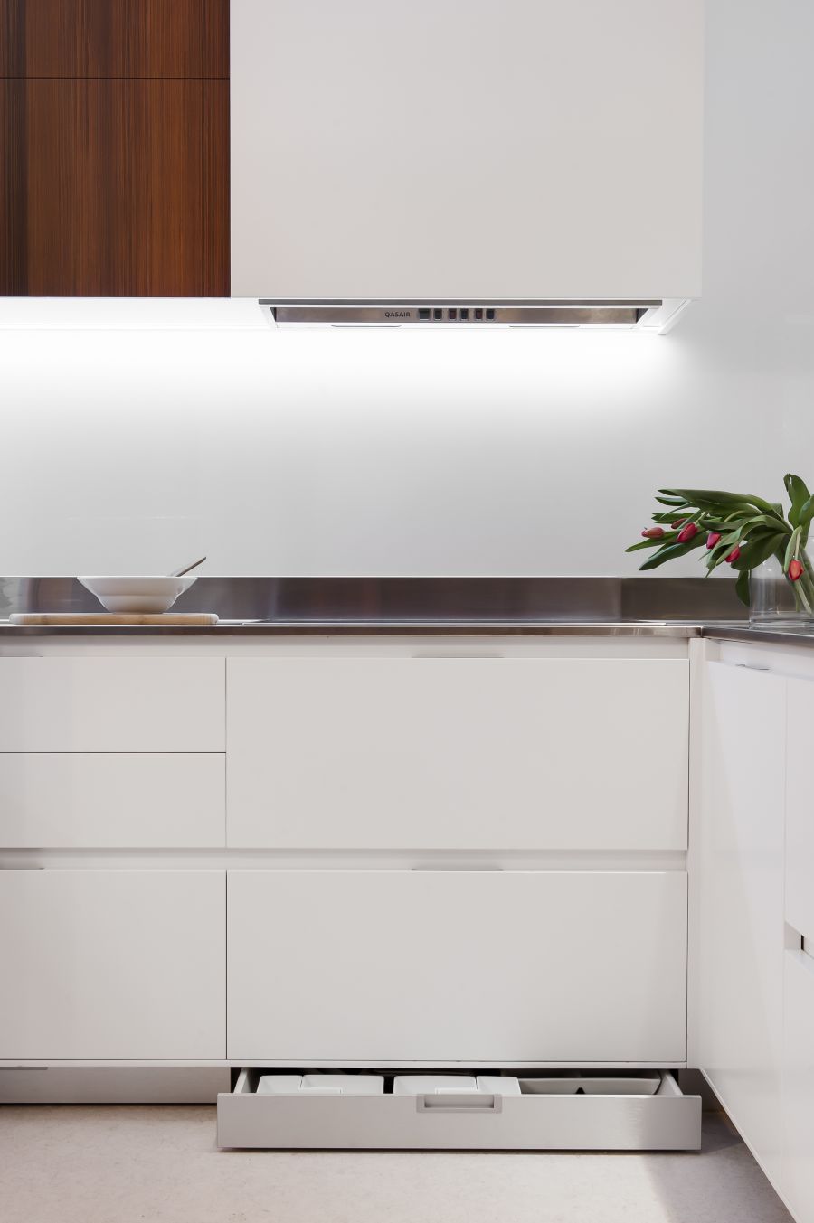 Sleek kitchen storage shelves in white