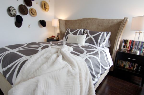 Unique headboard and the hat arrangement on the wall steal the show here!