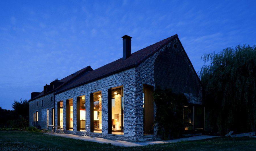 Rustic Farmhouse in Belgium Gets A Glassy Contemporary Makeover