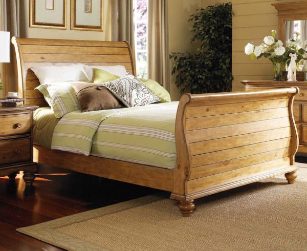 Warm wooden tones make the bedroom far more inviting