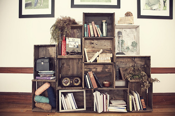 old crates turned into living room bookshelf