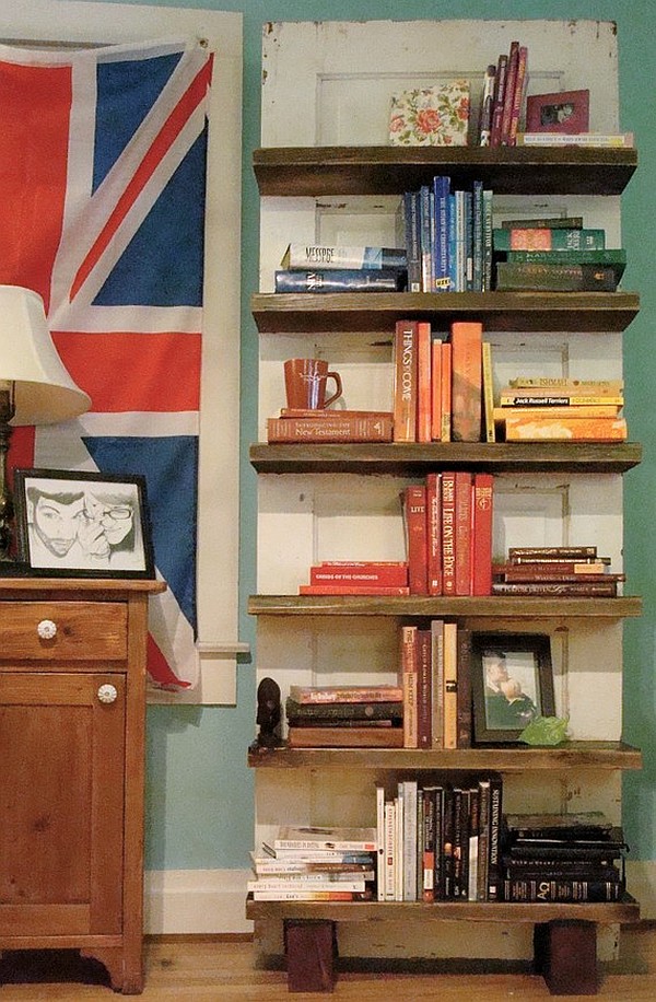 reclaimed hardwood door turned into bookshelf