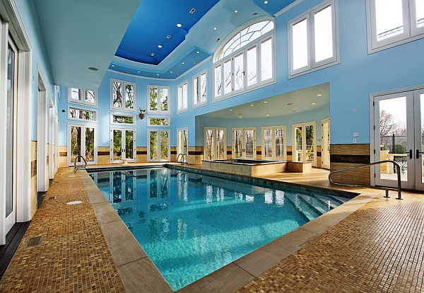 A multitude of windows surround the indoor pool