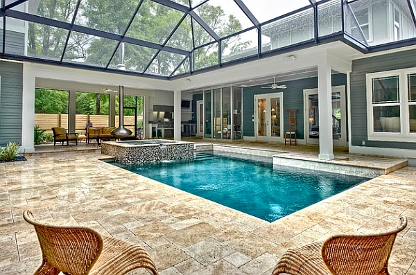 An orb fireplace and hot tub flank the cool pool