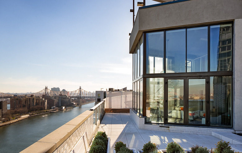 Balcony in New York City penthouse overlooking East River