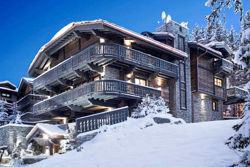 Beautifully lit Chalet Edelweiss in the evening