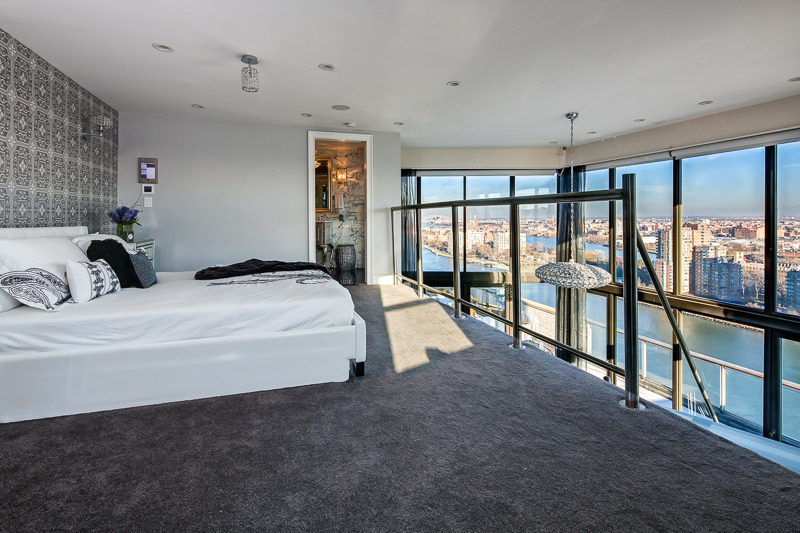 Bedroom with view of new york city skyline