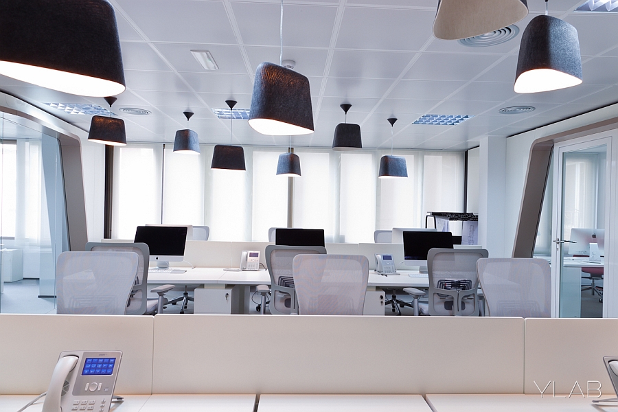 Black pendant lights in contemporary office