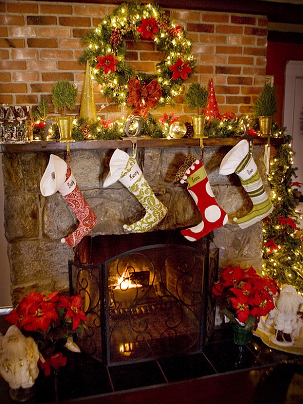 Christmas stockings pinned to the fireplace mantel