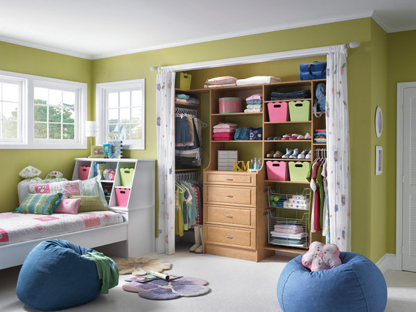 Colorful storage in a girl's room closet