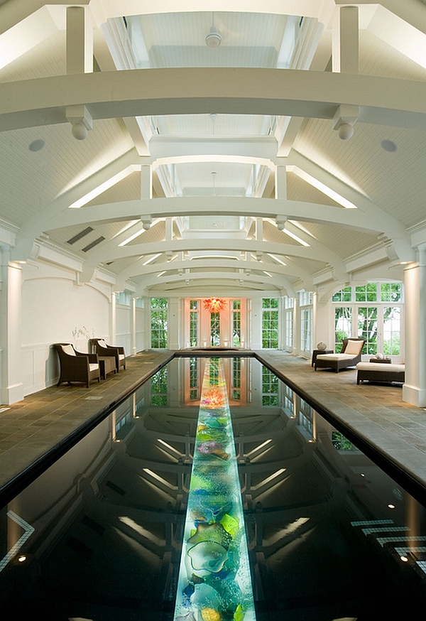 Colorful trough filled with art glass at the bottom of the pool