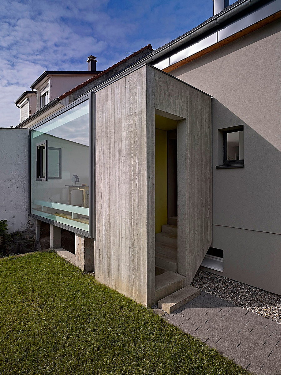 Concrete and glass exterior of the renovated French home