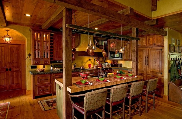 Creative use of vintage ladder as a DIY hanging pot rack in the kitchen