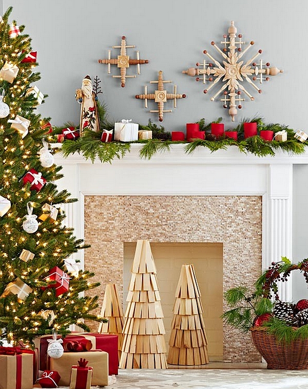 DIY wooden Christmas tree replicas and handmade snowflakes adorn the fireplace