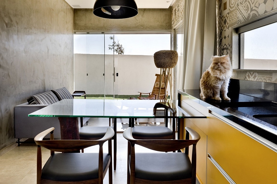 Dining space overlooking the living area and the outdoors