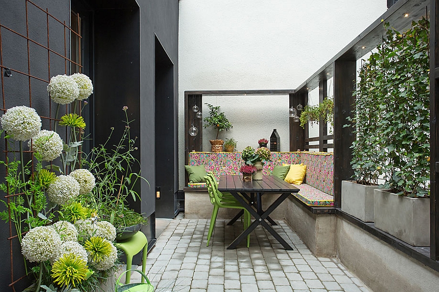 Gorgeous patio with stylish seating and plenty of greenery