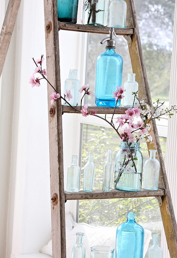 Hint of nature, vintage bottles and a rustic ladder create a unique DIY display