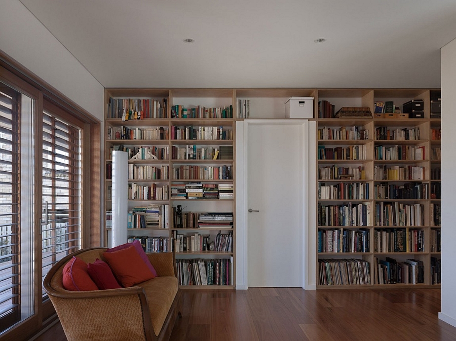 Home library design with a wall of books