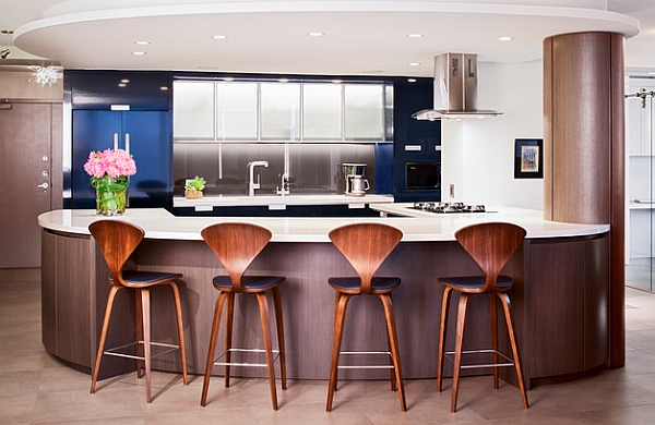 Iconic Cherner counter stools in walnut finish