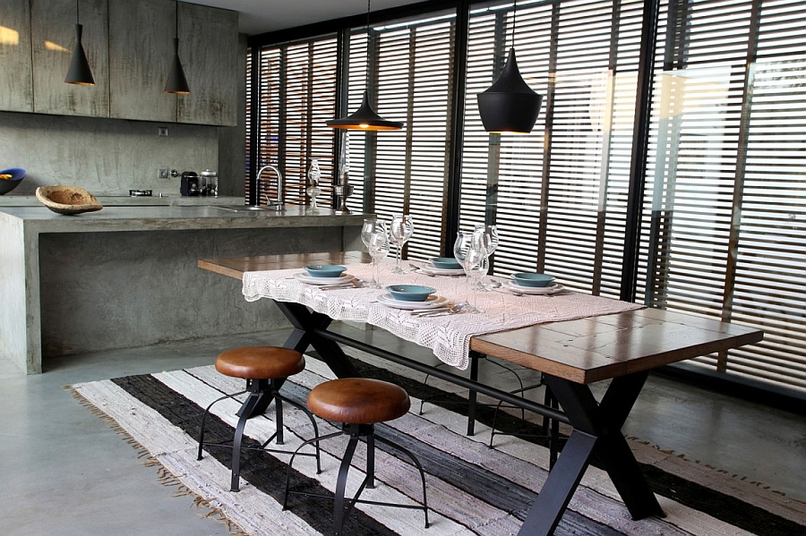 Industrial styled kitchen with cool pendant lights