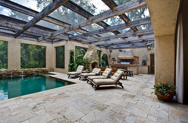 Lovely pool area combines Mediterranean style with a touch of rustic charm