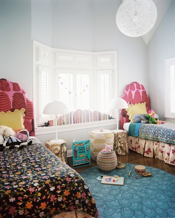 Matching twin beds in an eclectic room