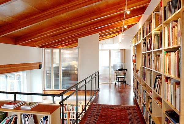 Mezzanines seem to be a popular choice to showcase the home library proudly!