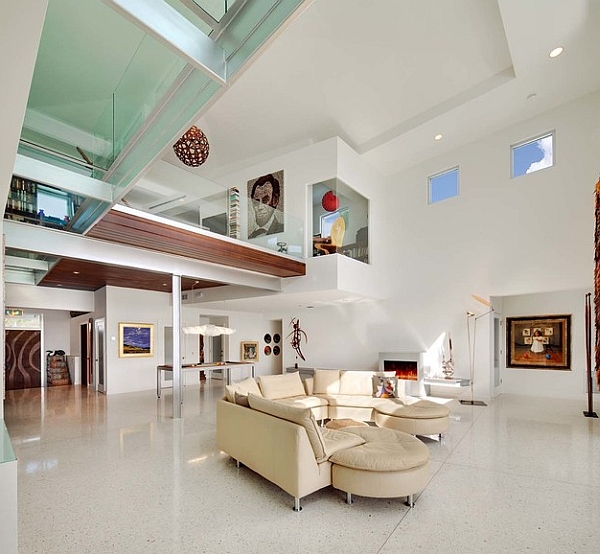 Modern living space with a mezzanine and a glass bridge