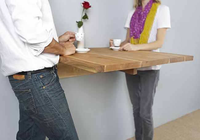 Modern wall mounted table at bar height