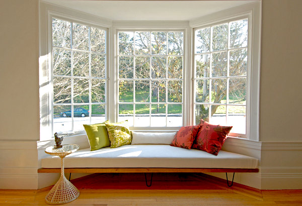 Modern window seat with colorful cushions