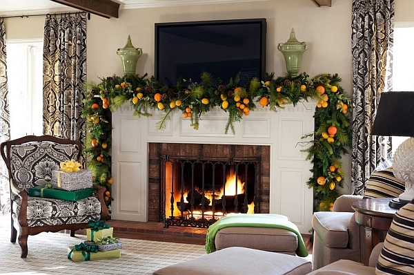 Natural orange and green Christmas decorations for the mantel