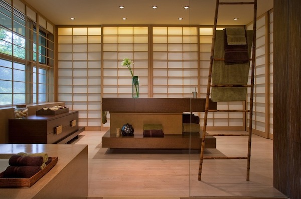 Oriental styled bathroom uses a ladder as towel rack