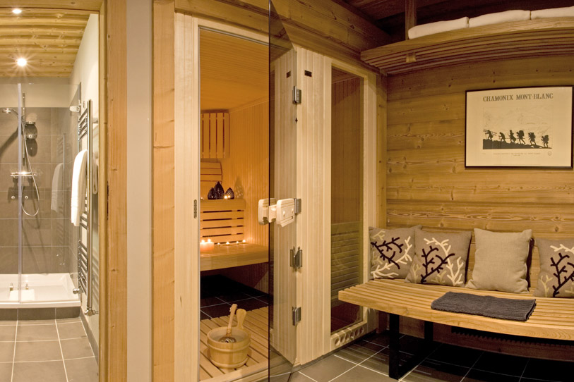 Sauna with glass shower area