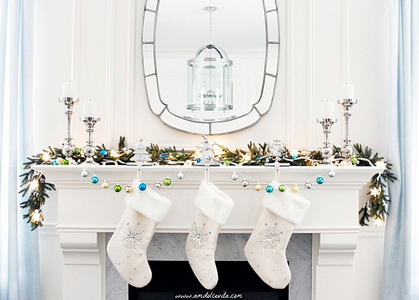 Sleek and stylish holiday mantel in white with hints of blue