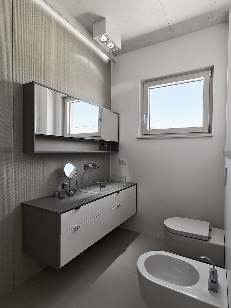 Small bathroom with floating vanity in grey