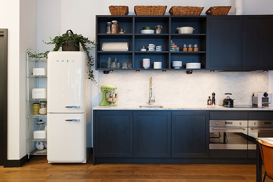 Small refrigerator and classic kitchen shelves in navy blue - Decoist